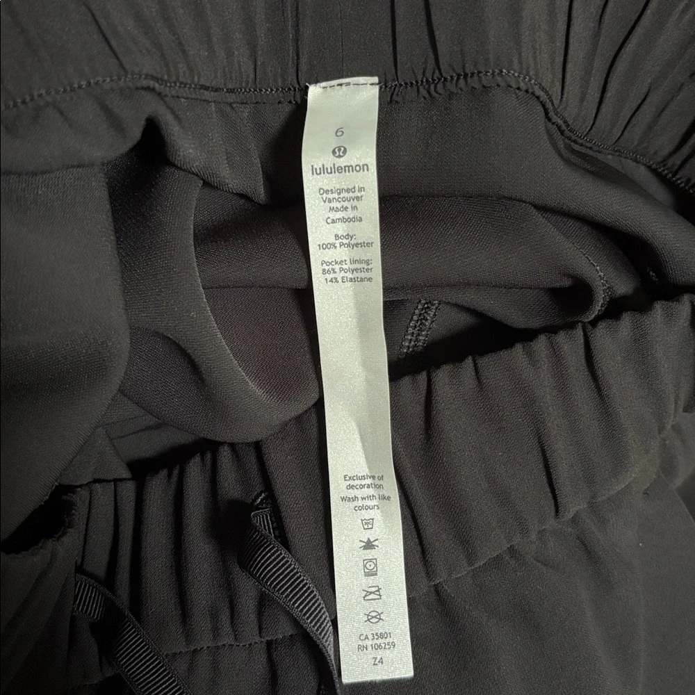 Lululemon On The Fly Pant Black Woven 27” Inseam - Picture 4 of 5